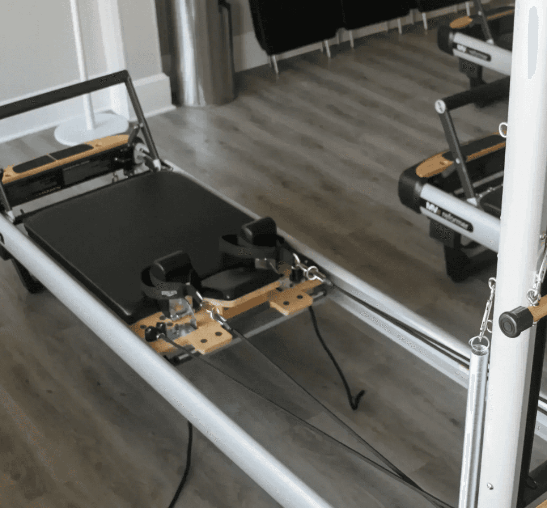 Two members training together during a duet Pilates session at CSFit Pilates